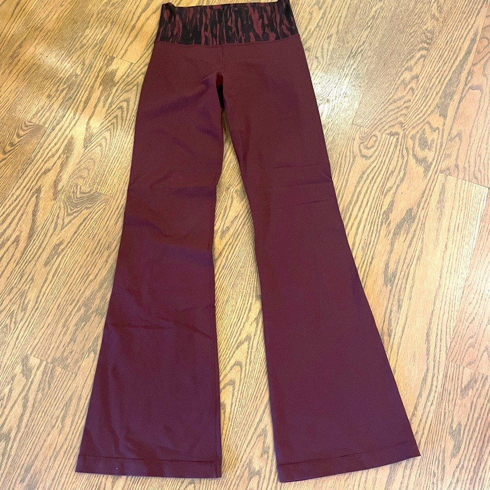Maroon size 6 lululemon groove pant with flare bottom.